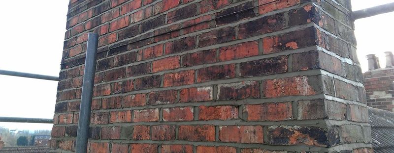 The brickwork of a chimney, close up