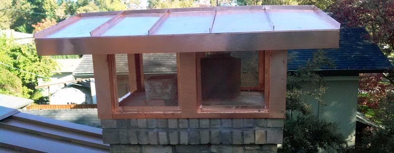 A large copper chimney cap