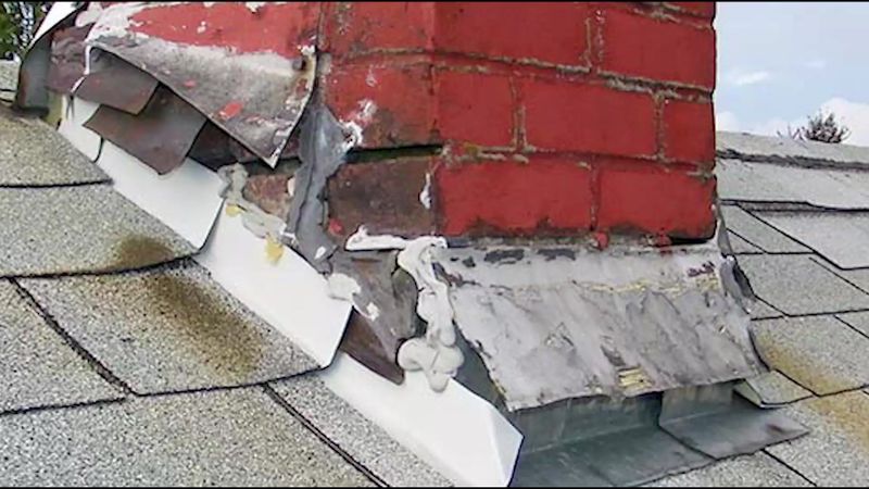 Old chimney flashing that has pulled away from the brick