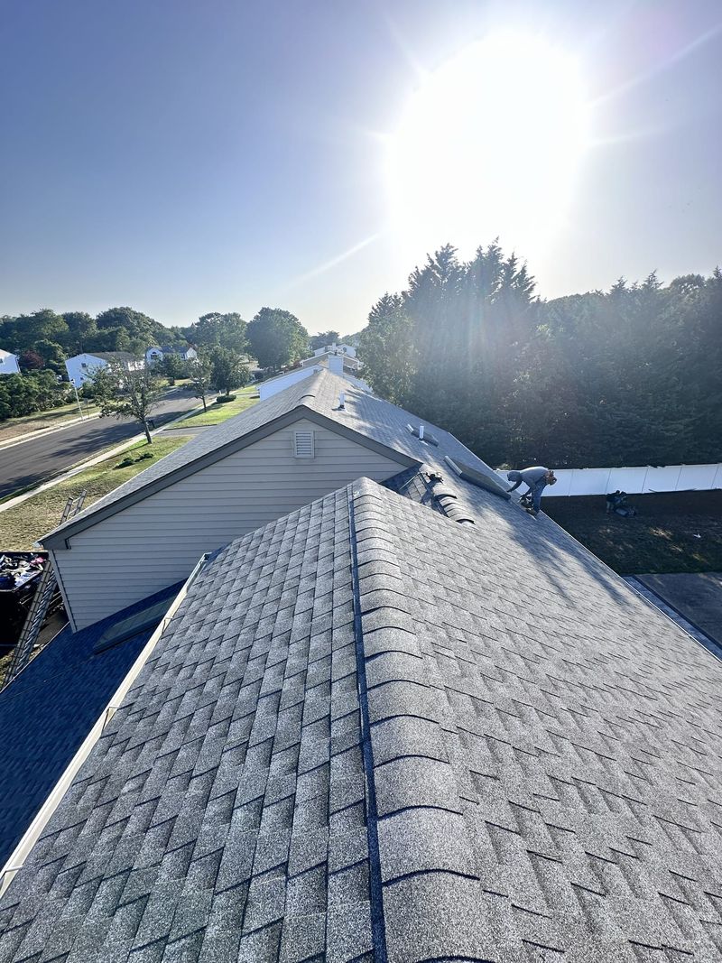 A finished grey architectural shingle roof