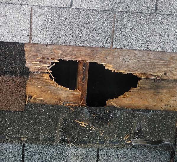 A hole through a roof deck
