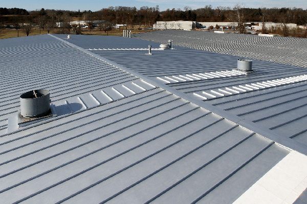 A large grey metal panel roof