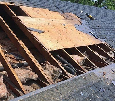 A roof opened up to the rafters during a repair