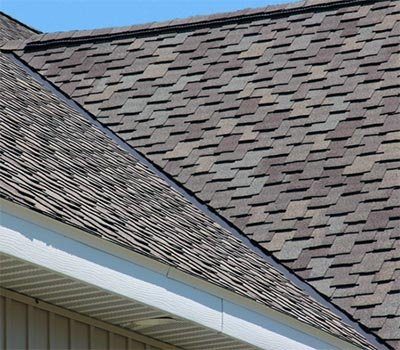 Architectural shingles running up to a gable